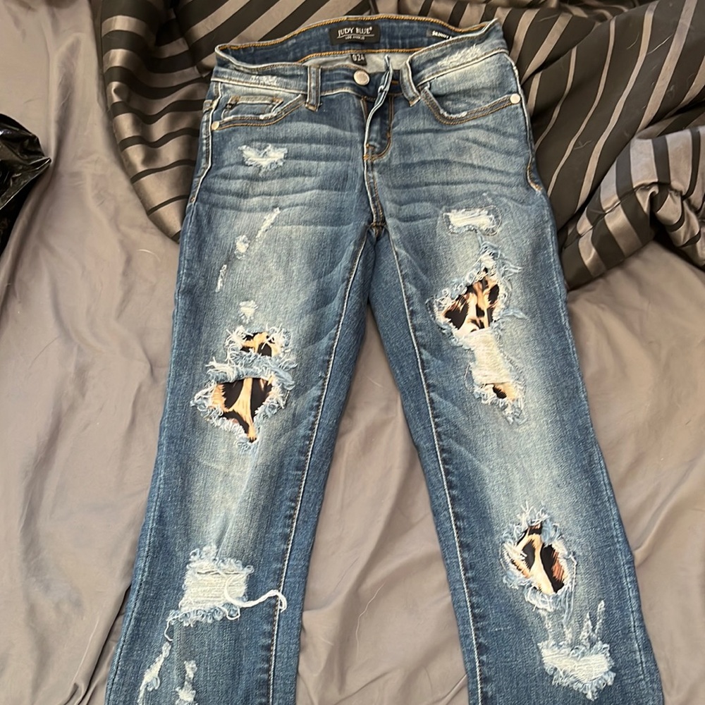 Judy, blue size 0\24 skinny fit cheetah print in the distressed areas never worn